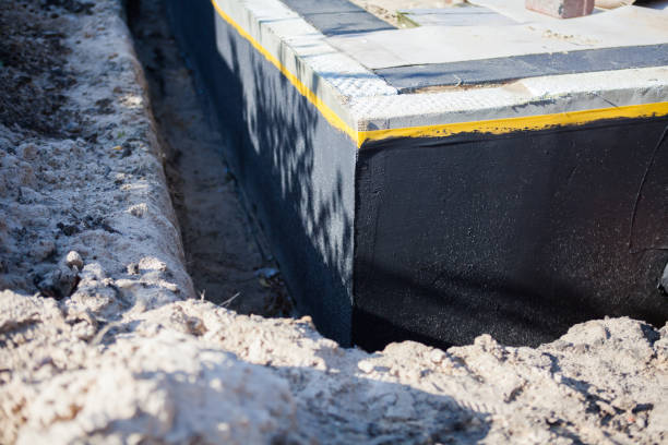 Professional Emergency Waterproofing technician working in Fremont, OH